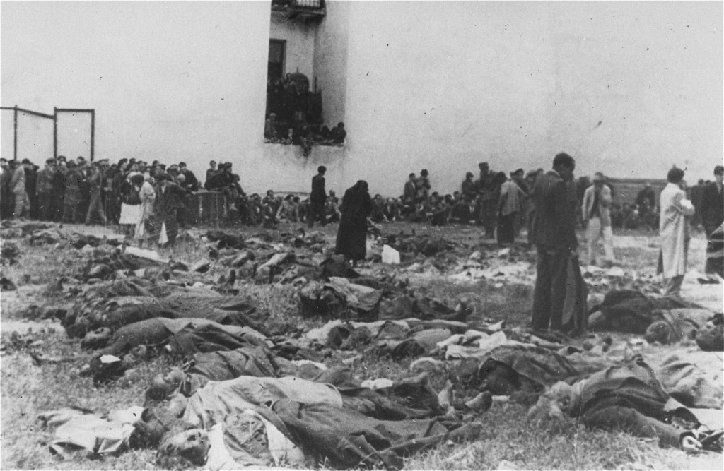 Lwów residents search for their friends and relatives among the corpses of Soviet prison massacre victims.