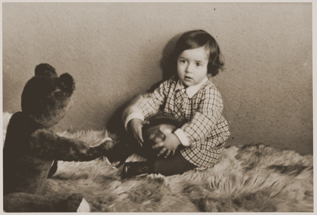 Photograph taken in December 1932 of Suse Grunbaum at age one. Soon after Hitler's 1933 seizure of power in Germany, two-year-old Suse and her parents fled to the Netherlands and settled in the town of Dinxperlo. In 1943, Jews in German-occupied Dinxperlo were ordered to assemble for deportation. Hearing of these plans, the Grünbaums went into hiding, finding refuge with Dutch farmers. The Hartemink family hid Suse and her mother for two years in their barn, first under the floorboards, then in a specially constructed hiding space.