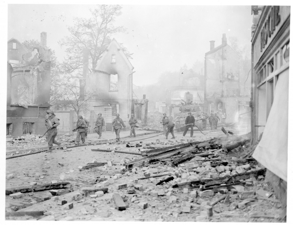 The US Army 8th Armored Division moves through Blankenburg, Germany, 1945