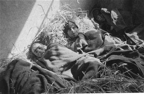 Survivors in a barracks at the Wöbbelin concentration camp.
