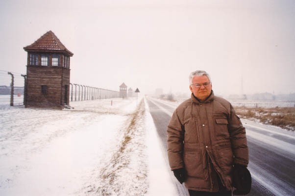 Thomas at Auschwitz in 1995, fifty years to the day after his forced march out of the camp as a child. [LCID: buerg5]