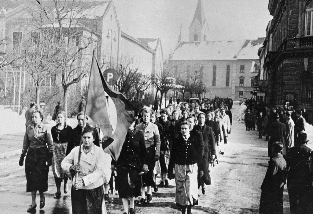 A parade of young Austrian women, members of the Nazi youth organization the League of German Girls (Bund Deutscher Maedel).