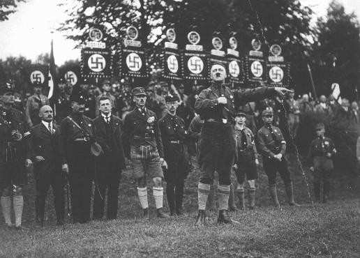 <p>Adolf Hitler speaks at a Nazi party rally. At the time, the Nazi party was a small splinter party with little influence in the Reichstag (German parliament). Nuremberg, Germany, August-September 1927.</p>
