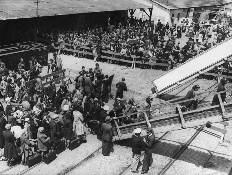 Jewish refugees in Lisbon, including a group of children from internment camps in France, board a ship that will transport them to the United States. Lisbon, Portugal, June 1941.