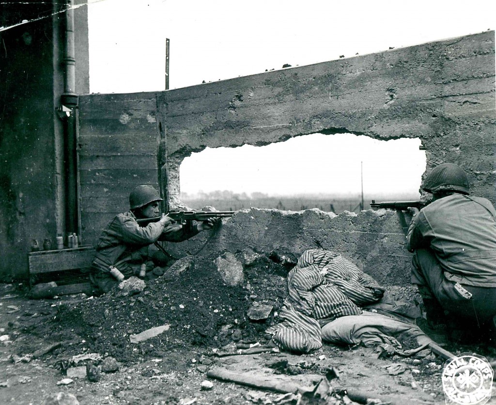 Members of the US Army 90th Infantry Division with rifles in France, 1944
