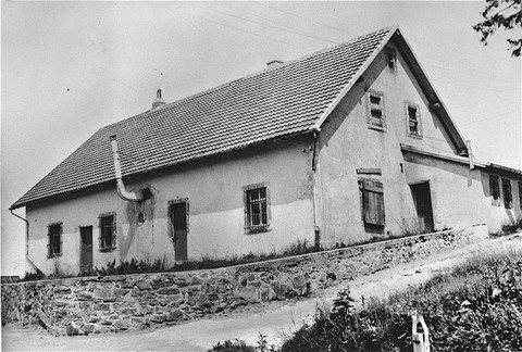 In August 1943 a gas chamber was installed in this building, seen here after the liberation of the camp, in the Natzweiler-Struthof ... [LCID: 01925]