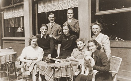 <p>The Jacobsthal family poses at an outdoor cafe. Amsterdam, the Netherlands, late 1930s.</p>