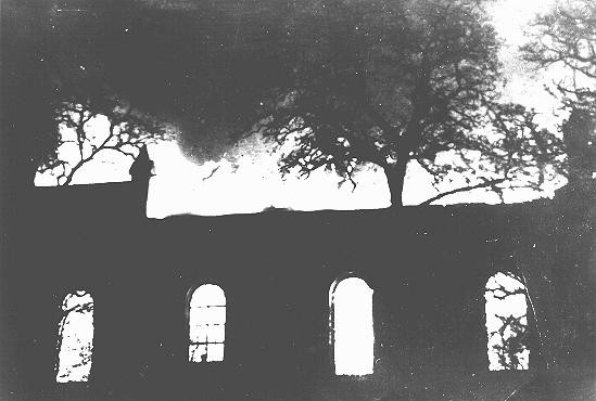 <p>A synagogue burns during Kristallnacht (the "Night of Broken Glass"). Chomutov, Czechoslovakia, November 9 or 10, 1938.</p>