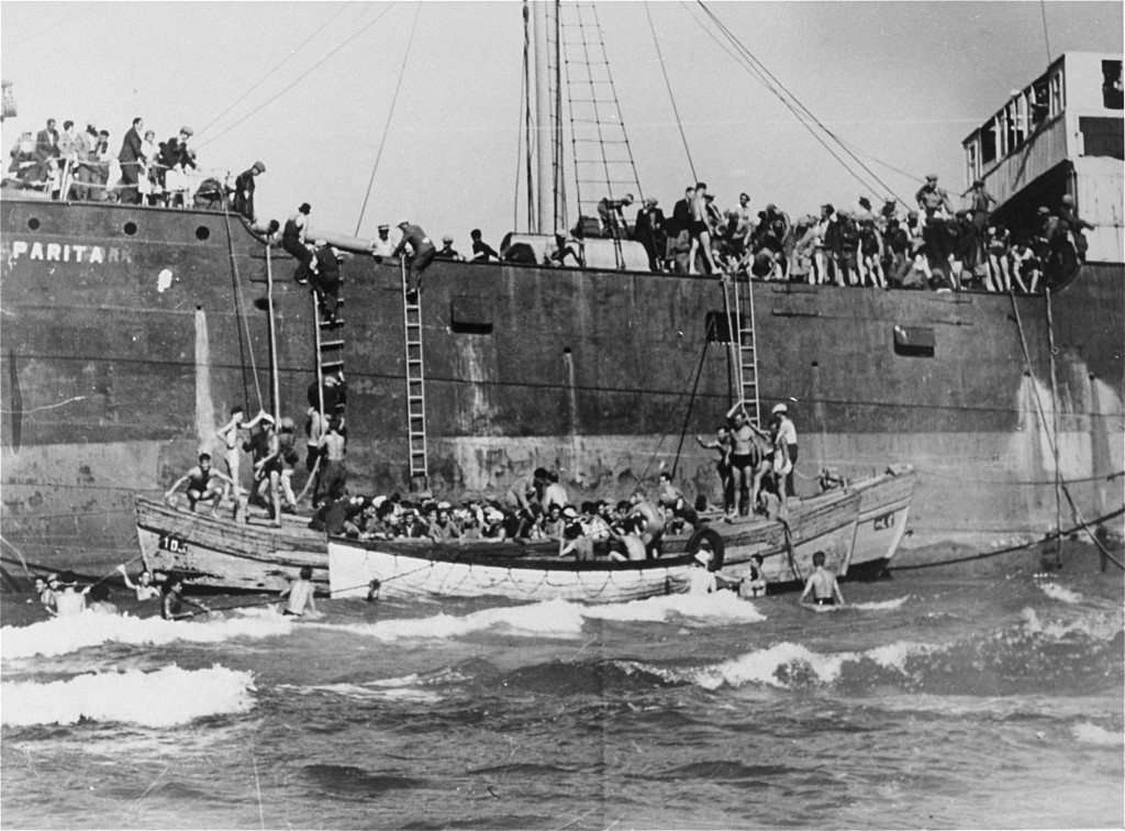 The Aliyah Bet ("illegal" immigration) ship Parita, carrying 850 Jewish refugees, lands on a sandbank off the Tel Aviv coast. The British arrested the passengers and interned them at Atlit detention camp. Palestine, August 21, 1939.