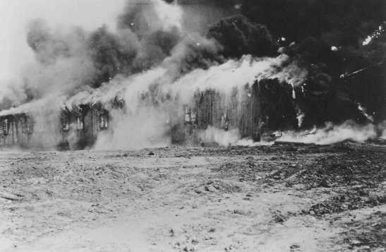 The Bergen-Belsen former concentration camp is burned to the ground to halt the spread of typhus. [LCID: 75136]