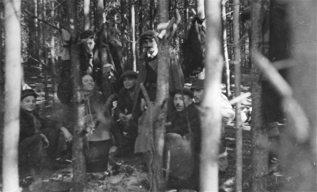 Jewish partisans, survivors of the Warsaw ghetto uprising, at a family camp in Wyszkow forest. [LCID: 85452]