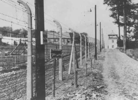 View of a guard tower and fence at the Buchenwald concentration camp.