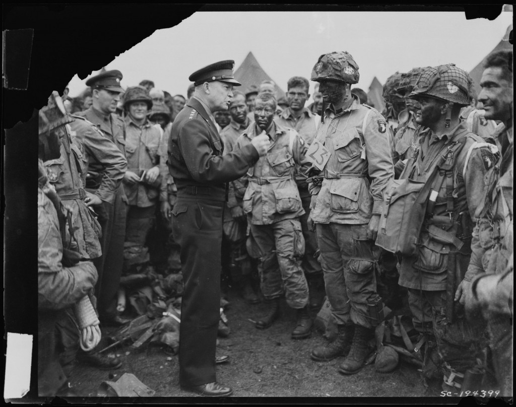 General Dwight D. Eisenhower visits with paratroopers of the 101st Airborne Division just hours before their jump into German-occupied France (D-Day). June 5, 1944.