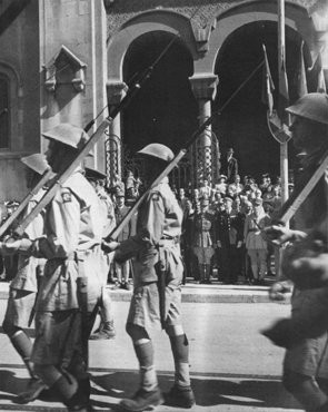 Allied troops march in Tunis following Allied success against Axis forces in the African Campaign. [LCID: tl165]