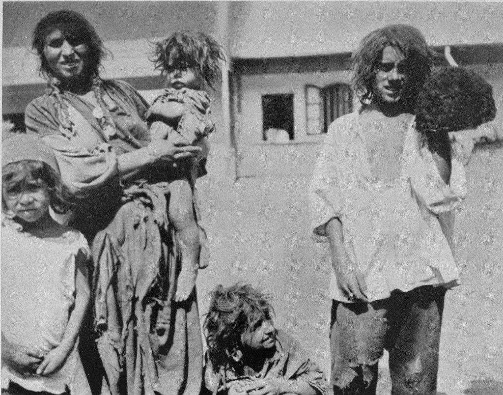 Romani (Gypsy) family near Craiova. Romania, probably 1930s. [LCID: 63359a]