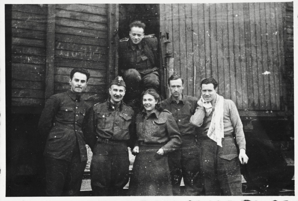 Six members of the Anders Army pose in front of a railcar prior to their departure for Iran.