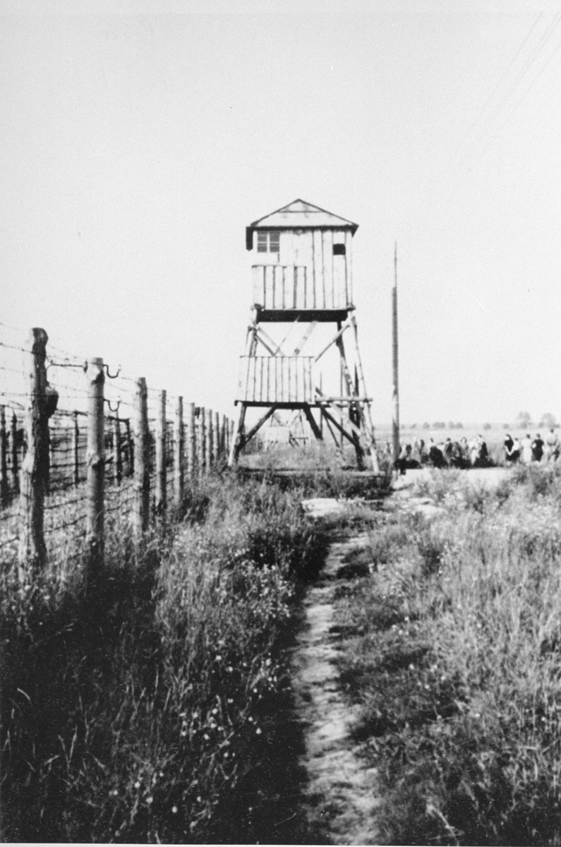 View of watchtower and fence at the Majdanek camp, post liberation. [LCID: 50511]