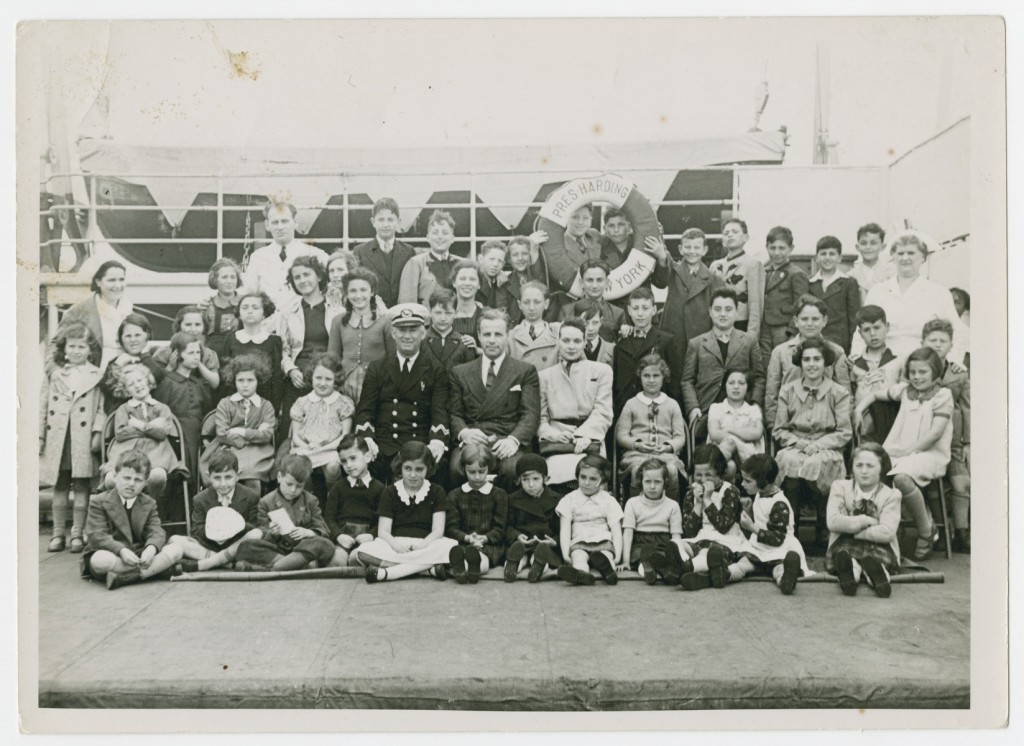 Gilbert and Eleanor Kraus (center) pose with the fifty Austrian Jewish children they brought to the United States.