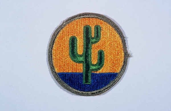 Insignia of the 103rd Infantry Division. The 103rd Infantry Division, the "Cactus" division, is so called after the 103rd's shoulder ... [LCID: n05653]