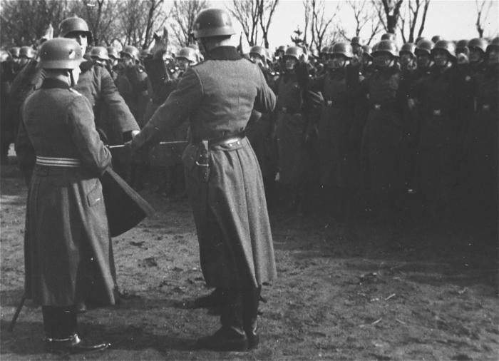 Troops with the Second Division, 134th Infantry Regiment, take the oath of obedience to Adolf Hitler. Germany, January 1939.