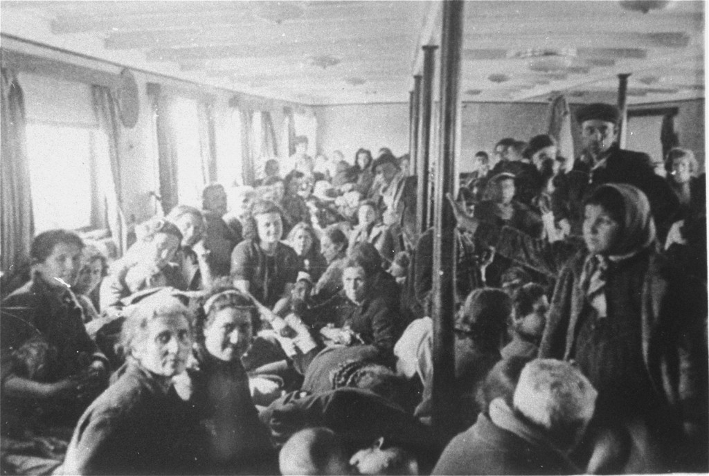 Thracian Jews crowded into an interior room of a deportation ship just before it left the port of Lom. [LCID: 79736]