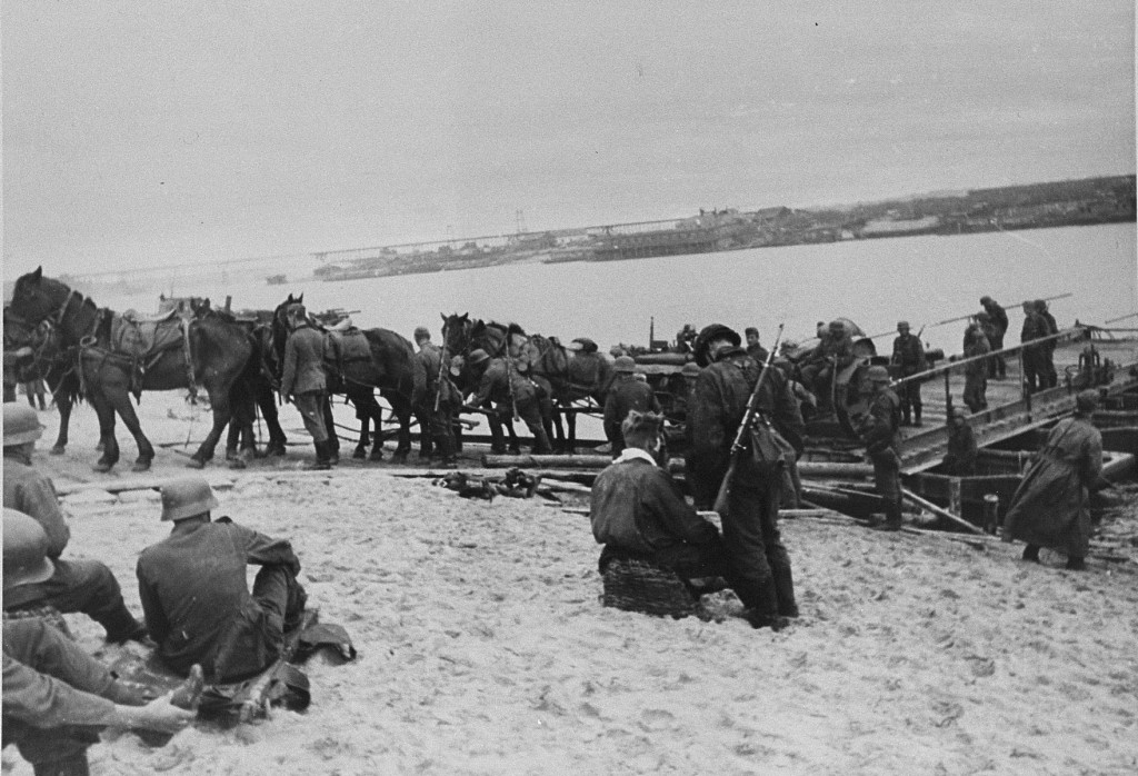German forces and supplies at a river crossing on the way to the front. [LCID: 08779]