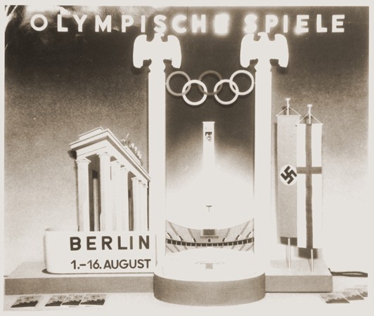 A display advertising the 11th Summer Olympic Games which were held in Berlin, Germany, 1936.