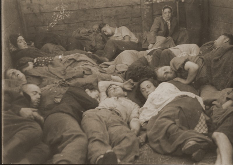 Jewish refugees, part of the Brihah (the postwar mass flight of Jews from eastern Europe), in a crowded boxcar on the way to a displaced persons camp in the American occupation zone. Germany, 1945 or 1946.