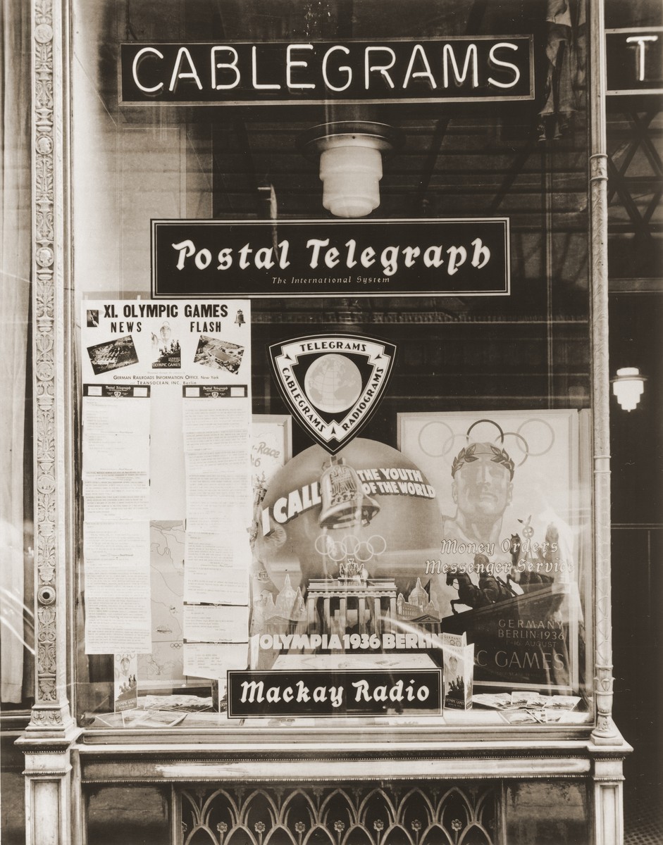 An American travel agency displays images of a peaceful Germany sent by the German Railways Information Office to attract visitors ... [LCID: oly108]