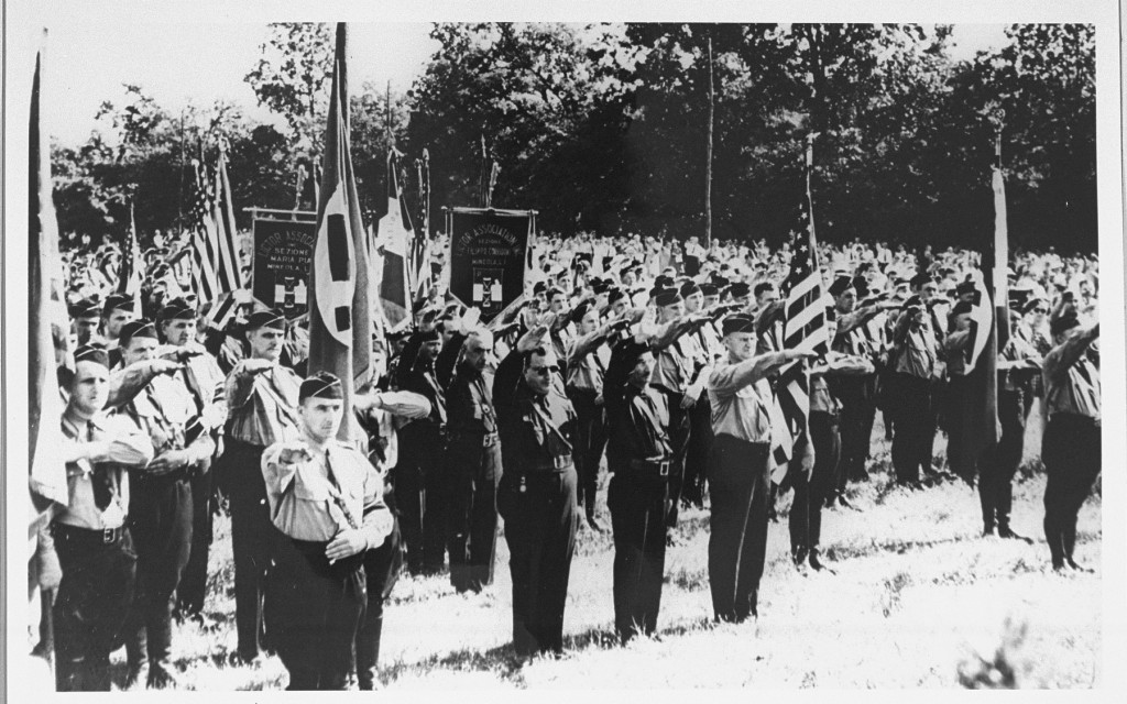 Members of the pro-Nazi German American Bund and the pro-Fascist Italian Blackshirts give the Nazi salute. [LCID: 00579]