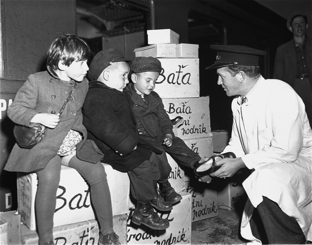 Jewish orphans fleeing Europe are fitted with shoes from the United Nations Relief and Rehabilitation Administration (UNRRA), en ... [LCID: 66639]