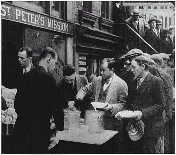 A long line of people waiting to be fed in New York City. In the absence of substantial government relief programs during 1932, free food was distributed with private funds in some urban centers to large numbers of the unemployed