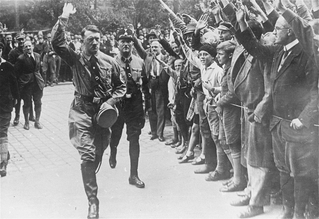 Adolf Hitler arriving at the fourth Nazi Party Congress.