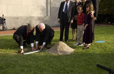 Benjamin Meed joins children in burying a time capsule  during the Tribute to Holocaust Survivors: Reunion of a Special Family, one of the Museum's tenth anniversary events.