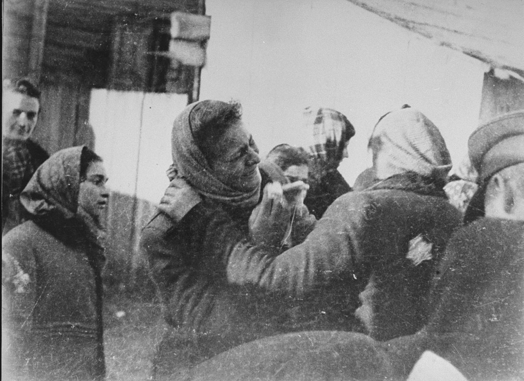 This clandestine photograph taken by George Kadish captures a scene during the deportation of Jews from the Kovno ghetto in German-occupied Lithuania in 1942.