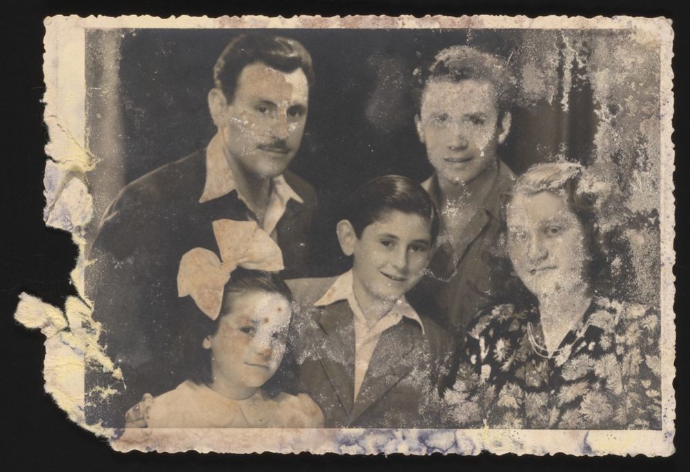 <p><span style="font-weight: 400;">Refik Veseli with Mosa, Gabriela, Gavra, and Irena Mandil after <a href="../../../../narrative/2388">World War II</a>.</span></p>
<p><span style="font-weight: 400;">The Mandil family returned to Novi Sad after the war. Mosa opened a new studio and continued working as a photographer. In 1946, Refik Veseli moved to Novi Sad to complete his apprenticeship with Mosa. The Mandil family immigrated to the newly created state of Israel in 1948. Refik Veseli and his parents were eventually honored by Yad Vashem as <a href="../../../../narrative/11778">Righteous Among the Nations</a>.</span></p>