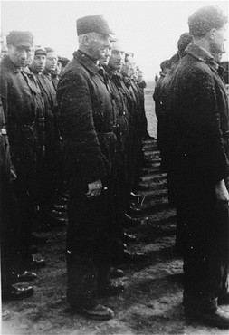 Roll call of the camp Jewish police. Westerbork transit camp, the Netherlands, 1942 or 1943.