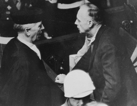 Joachim von Ribbentrop (Foreign Minister of Germany from 1938 to 1945) speaks with his lawyer, Dr.