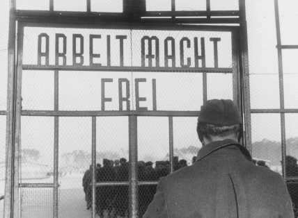 <p>"Work makes one free," a sign on the gate at Sachsenhausen concentration camp. Germany, February 1941.</p>