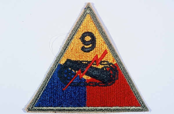 Insignia of the 9th Armored Division. Although no nickname for the 9th was in common usage throughout the war, "Phantom" division ... [LCID: n05628]