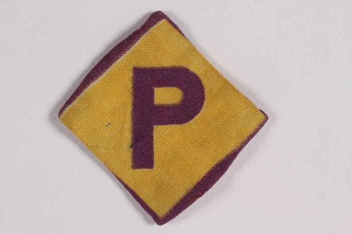 Forced labor badge worn by Eugeniusz Wojtas, a Catholic Polish soldier interned by the Germans from 1940-1945