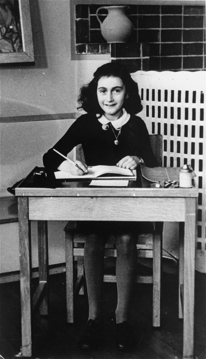 Anne Frank at 11 years of age, two years before going into hiding. [LCID: 49361]