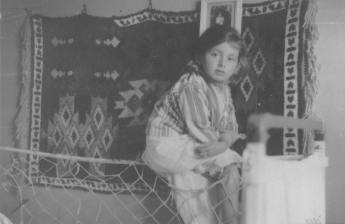 Portrait of a young Jewish girl, Lida Kleinman sitting in her room in Lacko.
