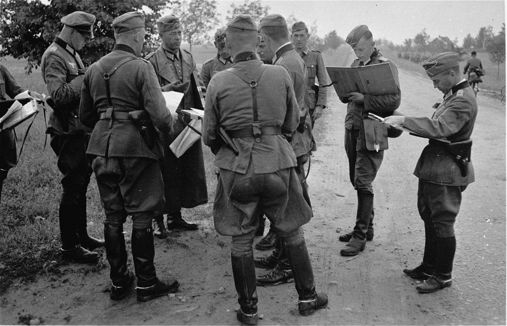 German officers review their orders during the invasion of the Soviet Union in 1941. [LCID: 15583]