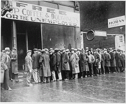 Unemployed men queued outside a depression soup kitchen  in Chicago