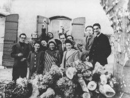 A Group of Artists Pose around Varian Fry at the Villa Air-Bel outside Marseille