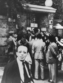 Hungarian Jews wait in front of the Swedish legation main office in hopes of obtaining Swedish protective passes. [LCID: 74025]