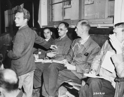 A witness for the prosecution at a war crimes trial identifies a doctor who denied medical care to prisoners at the Dora-Mittelbau ... [LCID: 43064]