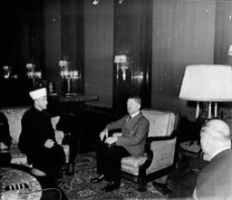 The former Mufti of Jerusalem, Hajj Amin al-Husayni, meets Hitler for the first time. Berlin, Germany, November 28, 1941.