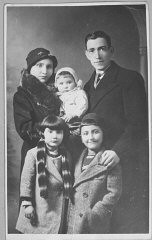 Portrait of Yakov Testa with wife and three children in Bitola.
This photograph was one of the individual and family portraits of members of the Jewish community of Bitola, Macedonia, used by Bulgarian occupation authorities to register the Jewish population prior to its deportation in March 1943.